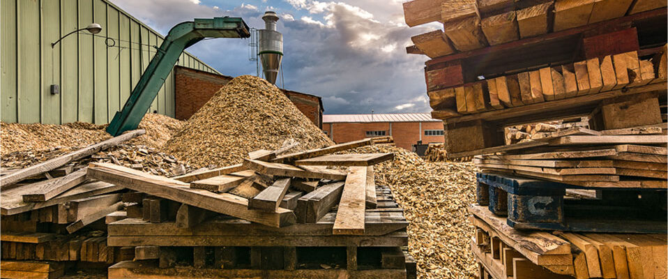 Piles of old pallets and wood chippings