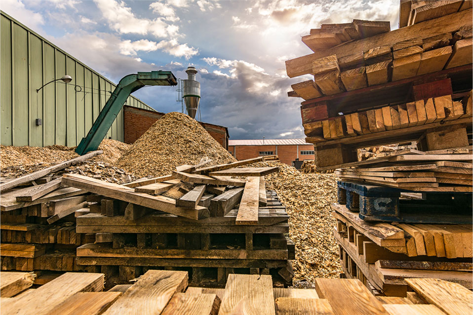 Piles of old pallets and wood chippings